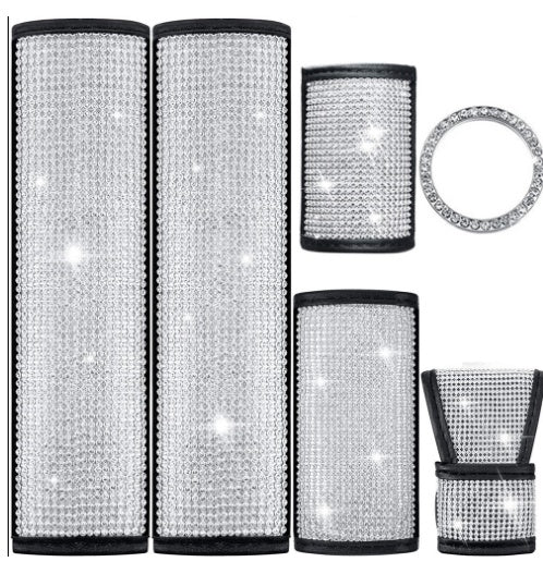 Luxury Diamond Luxe Crystal Car Kit with glittering rhinestone accessories, including seat belt covers and ring accents for car interiors.