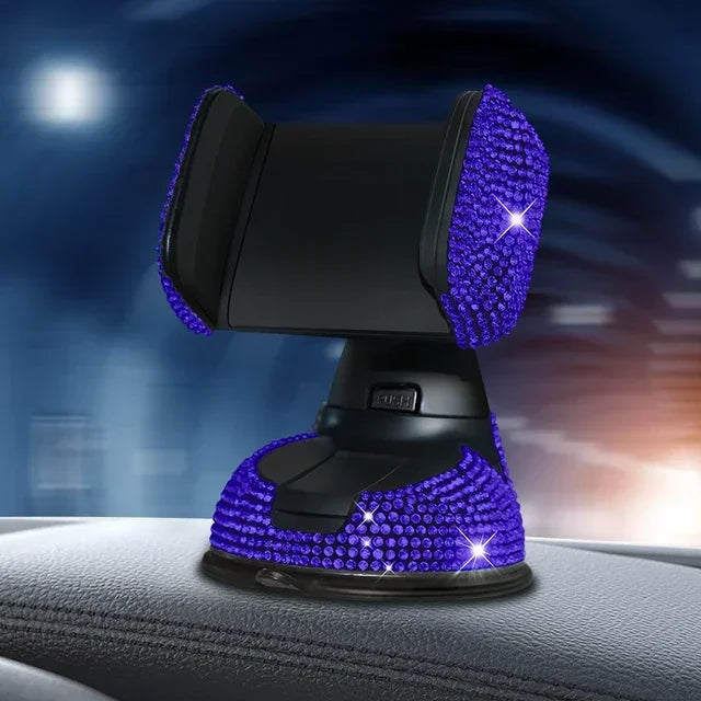 Blue crystal rhinestone phone holder with suction cup base on car dashboard