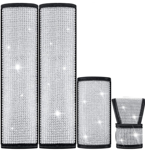 Close-up of Diamond Luxe Crystal Car Kit components including seat belt covers and bling accessories, ideal for luxury car interior upgrades.